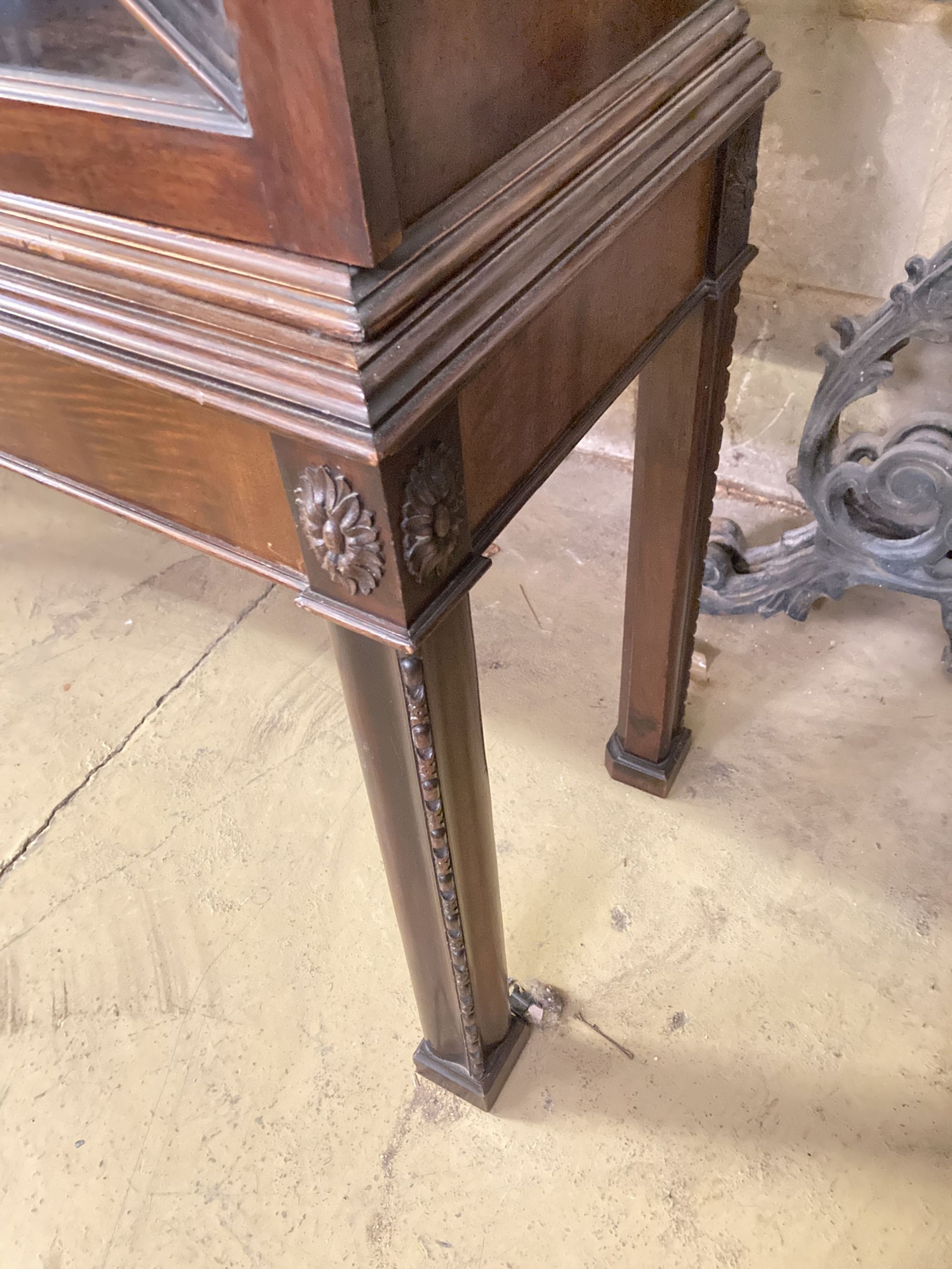 An early 20th century Chippendale revival glazed mahogany bookcase, width 120cm, depth 35cm, height 169cm